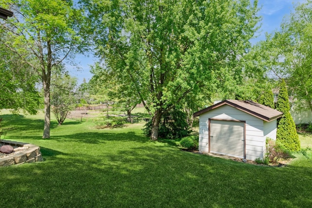 13073 Eldorado St NE, Blaine, MN 55449 - view of green lawn with an outdoor structure