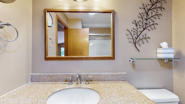 13073 Eldorado St NE, Blaine, MN 55449 - bathroom with vanity and toilet