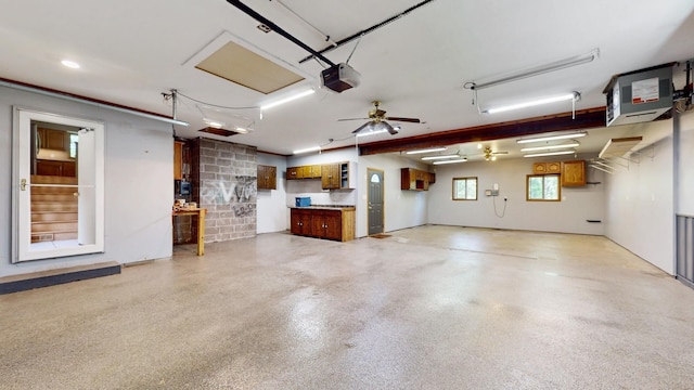 13073 Eldorado St NE, Blaine, MN 55449 - garage featuring a garage door opener