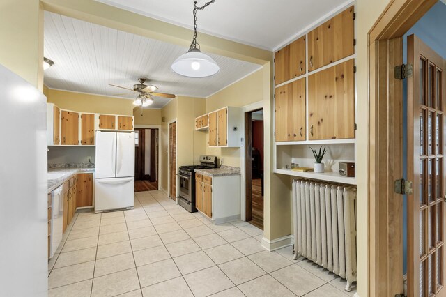 kitchen with radiator, white appliances, light tile patterned floors, light countertops, and ceiling fan