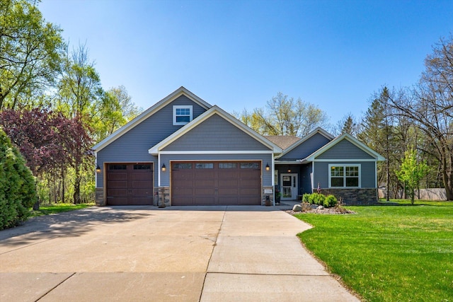 2356 Laport Dr, Mounds View, MN 55112 - craftsman house featuring stone siding, concrete driveway, an attached garage, and a front lawn
