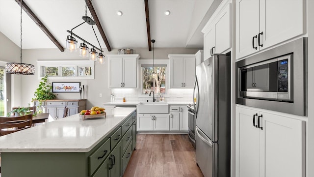 2356 Laport Dr, Mounds View, MN 55112 - kitchen featuring stainless steel appliances, a sink, white cabinetry, light wood-style flooring, and recessed lighting