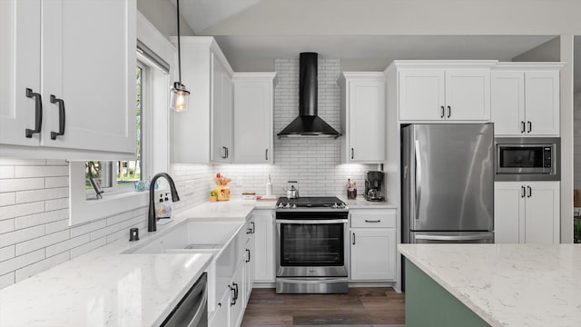 2356 Laport Dr, Mounds View, MN 55112 - kitchen featuring appliances with stainless steel finishes, wall chimney range hood, backsplash, light stone counters, and dark wood-type flooring