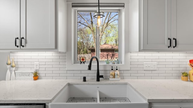 2356 Laport Dr, Mounds View, MN 55112 - kitchen featuring a sink, tasteful backsplash, and dishwasher