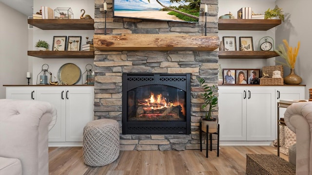 2356 Laport Dr, Mounds View, MN 55112 - living area featuring a fireplace and light wood-style floors