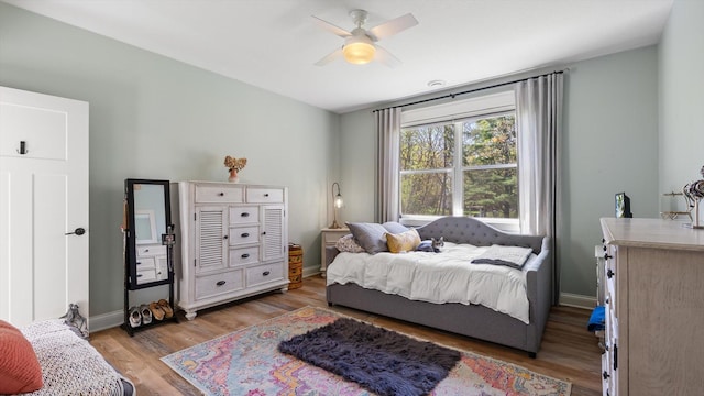 2356 Laport Dr, Mounds View, MN 55112 - bedroom featuring light wood-style flooring, baseboards, and ceiling fan