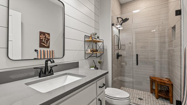 2356 Laport Dr, Mounds View, MN 55112 - full bathroom with a shower stall, vanity, and toilet