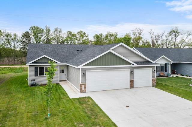 508 14th St NW, Waseca, MN 56093 - ranch-style home featuring a garage, roof with shingles, concrete driveway, a front lawn, and stone siding