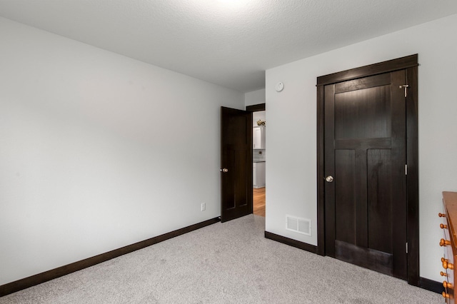 508 14th St NW, Waseca, MN 56093 - unfurnished bedroom with carpet and baseboards