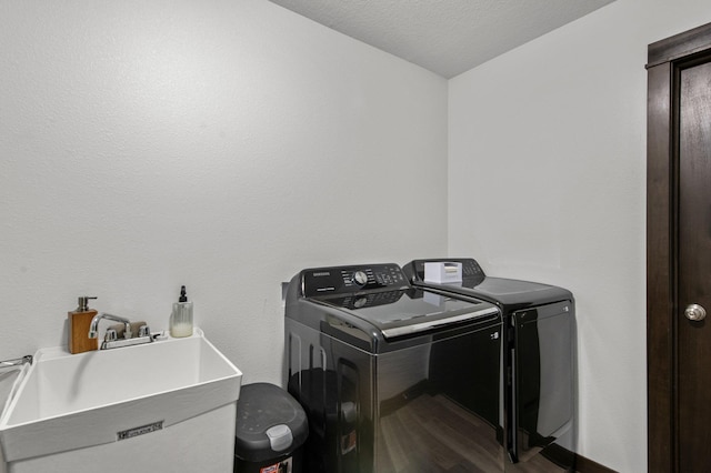 508 14th St NW, Waseca, MN 56093 - washroom with independent washer and dryer and dark wood-type flooring