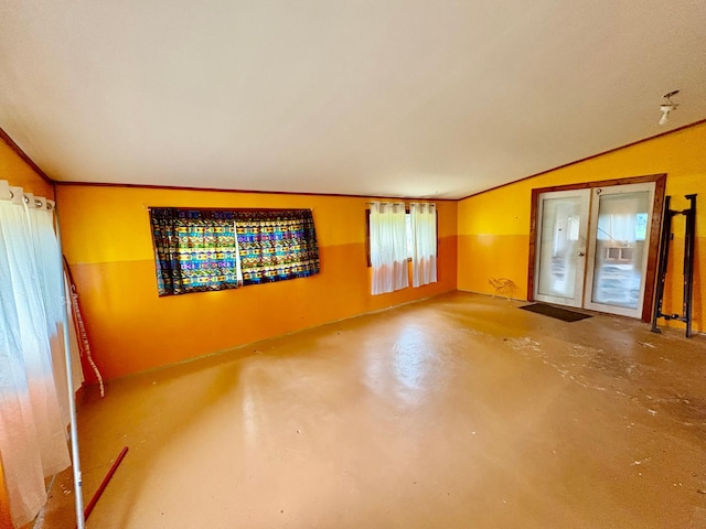 113 6th Ave SE, Baudette, MN 56623 - spare room featuring concrete floors and lofted ceiling