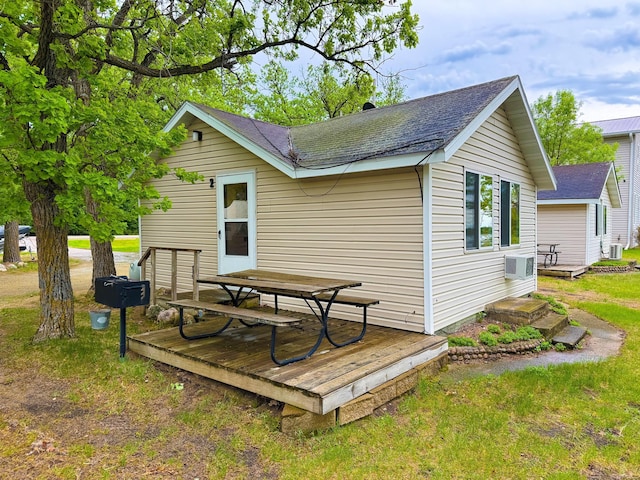 27621 83 Unit 2, Battle Lake, MN 56515 - rear view of property featuring a deck and roof with shingles