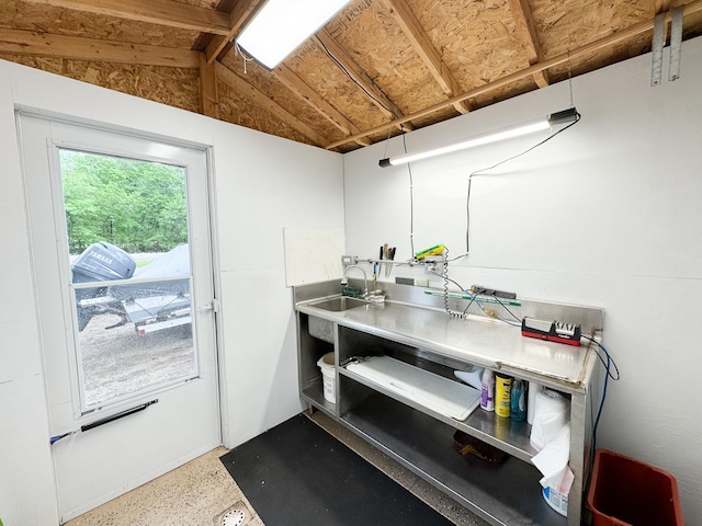 27621 83 Unit 2, Battle Lake, MN 56515 - miscellaneous room featuring vaulted ceiling, a sink, and speckled floor