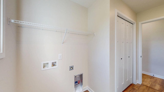 1483 Grand View Ln SE, Mazeppa, MN 55956 - laundry area with hookup for an electric dryer, washer hookup, and wood finished floors