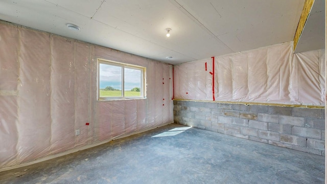 1483 Grand View Ln SE, Mazeppa, MN 55956 - unfurnished room featuring unfinished concrete flooring and a smoke detector