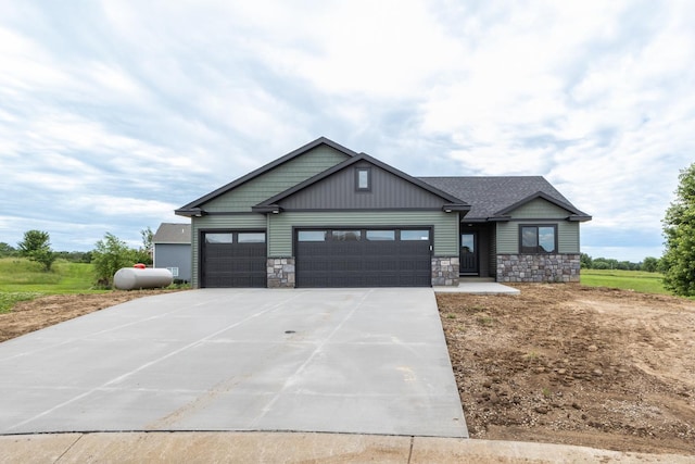 1483 Grand View Ln SE, Mazeppa, MN 55956 - craftsman inspired home with stone siding, a garage, and concrete driveway