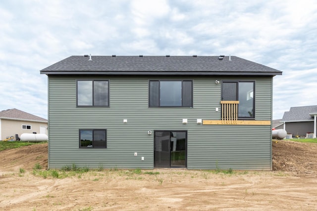 1483 Grand View Ln SE, Mazeppa, MN 55956 - rear view of house featuring a shingled roof