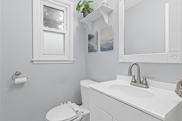 7912 Hillside Trl S, Cottage Grove, MN 55016 - bathroom featuring vanity and toilet