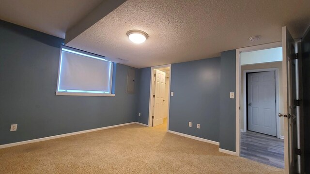 2714 Colleen St NE, Rochester, MN 55906 - unfurnished bedroom featuring carpet flooring, a textured ceiling, and baseboards