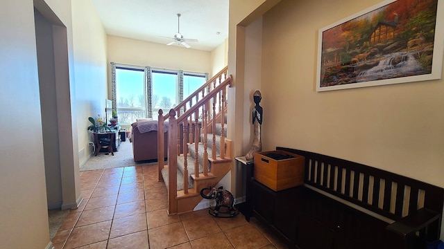 2714 Colleen St NE, Rochester, MN 55906 - hallway featuring tile patterned flooring and stairs