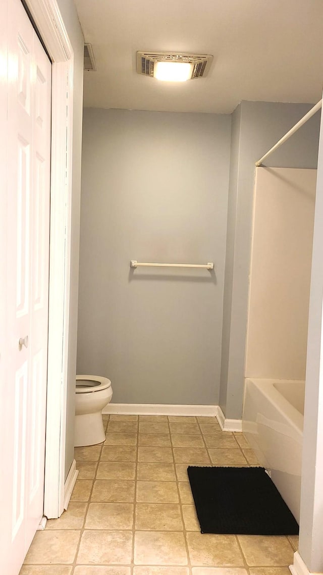 2714 Colleen St NE, Rochester, MN 55906 - bathroom featuring tile patterned flooring, a closet, and shower / bath combination