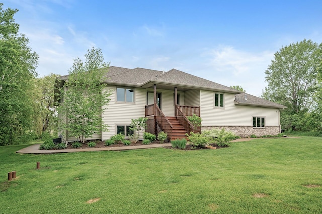 4756 121st Ave NE, Blaine, MN 55449 - view of front of home featuring stairway, a front lawn, and roof with shingles