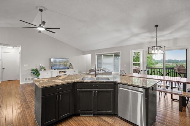 4756 121st Ave NE, Blaine, MN 55449 - kitchen with stainless steel dishwasher, a sink, vaulted ceiling, ceiling fan, and wood finished floors