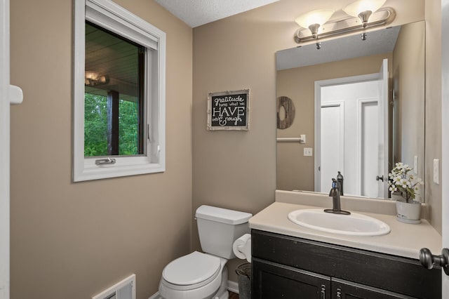 4756 121st Ave NE, Blaine, MN 55449 - half bath featuring vanity and toilet