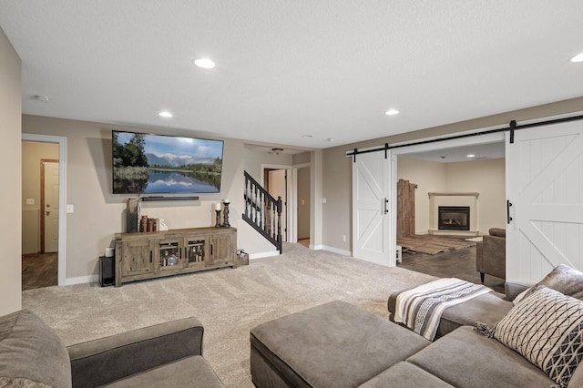 4756 121st Ave NE, Blaine, MN 55449 - living room with a barn door, baseboards, recessed lighting, and carpet flooring