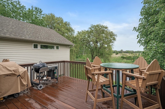 4756 121st Ave NE, Blaine, MN 55449 - wooden terrace with outdoor dining space and area for grilling