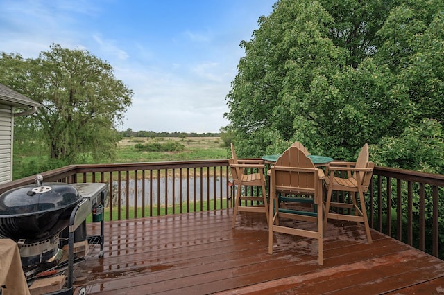 4756 121st Ave NE, Blaine, MN 55449 - wooden deck featuring outdoor dining area and grilling area