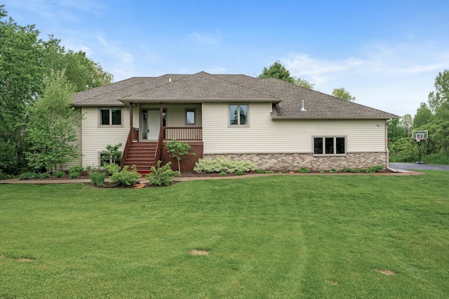 4756 121st Ave NE, Blaine, MN 55449 - view of front of property with a front yard, a porch, and roof with shingles