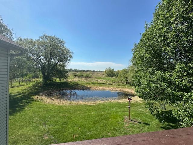 4756 121st Ave NE, Blaine, MN 55449 - view of green lawn featuring a water view