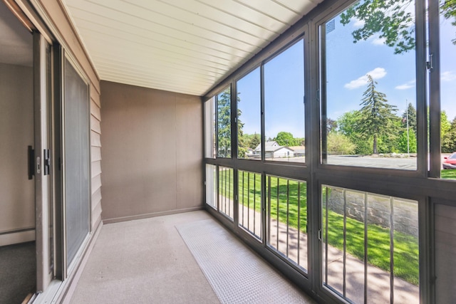 999 41st Ave NE Unit 110Ne, Columbia Heights, MN 55421 - unfurnished sunroom with carpet floors and baseboards