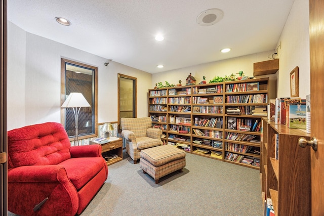 999 41st Ave NE Unit 110Ne, Columbia Heights, MN 55421 - sitting room featuring carpet floors, recessed lighting, and bookshelves