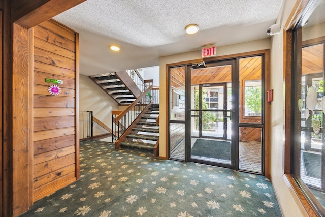 999 41st Ave NE Unit 110Ne, Columbia Heights, MN 55421 - entrance foyer with carpet flooring, plenty of natural light, stairway, a textured ceiling, and recessed lighting