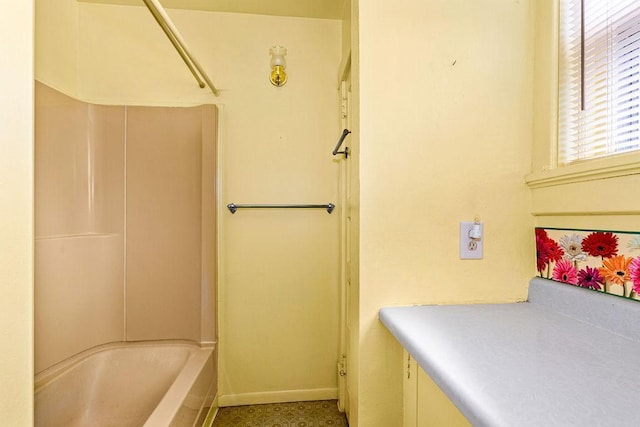 bathroom with shower / bathtub combination