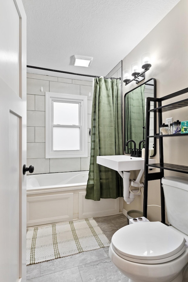 37 Harrison Ave S, Hopkins, MN 55343 - full bathroom with shower / bathtub combination with curtain and a textured ceiling