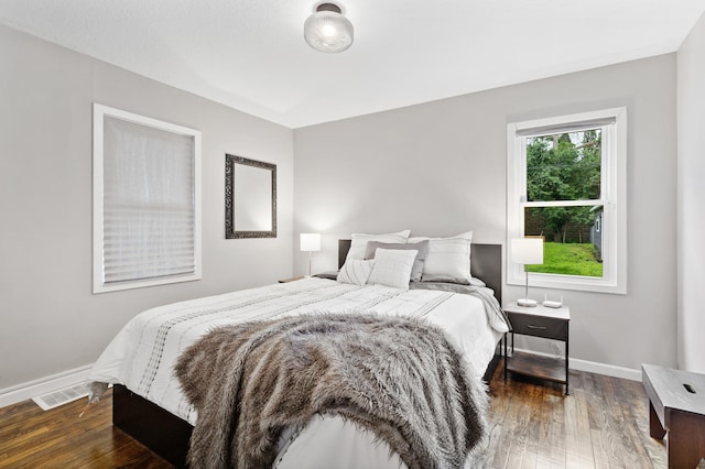37 Harrison Ave S, Hopkins, MN 55343 - bedroom featuring hardwood / wood-style flooring and baseboards