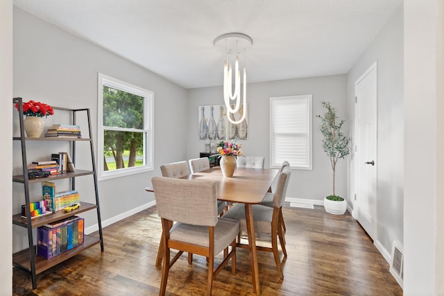 37 Harrison Ave S, Hopkins, MN 55343 - dining room featuring dark wood-style floors and baseboards