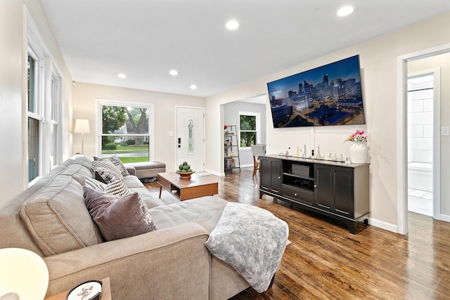 37 Harrison Ave S, Hopkins, MN 55343 - living area featuring dark wood-type flooring, bar, and recessed lighting