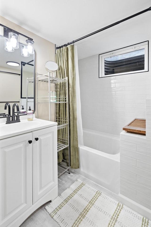 37 Harrison Ave S, Hopkins, MN 55343 - bathroom with shower / tub combo and vanity