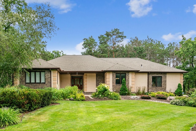10791 3rd Street Pl N, Lake Elmo, MN 55042 - view of front of house with a front lawn, brick siding, and a shingled roof