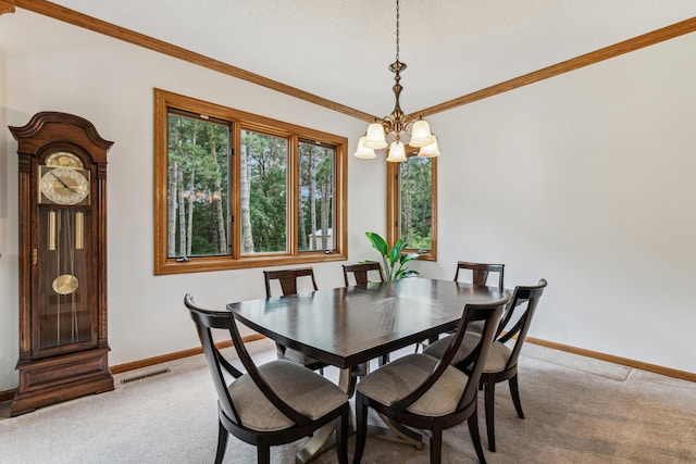 10791 3rd Street Pl N, Lake Elmo, MN 55042 - dining space with a chandelier, light carpet, baseboards, and ornamental molding