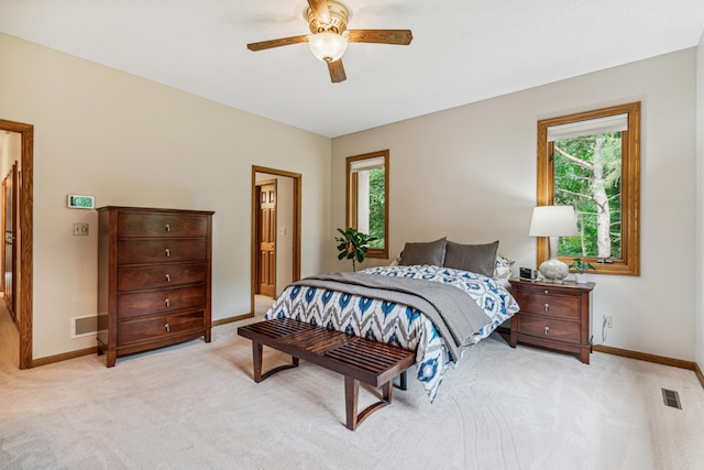10791 3rd Street Pl N, Lake Elmo, MN 55042 - bedroom with light colored carpet, baseboards, and a ceiling fan