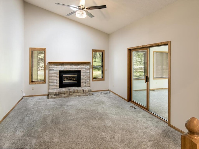 17768 Keystone Ave, Lakeville, MN 55044 - unfurnished living room with carpet, lofted ceiling, baseboards, ceiling fan, and a brick fireplace