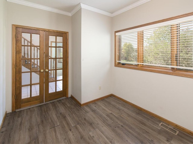 17768 Keystone Ave, Lakeville, MN 55044 - spare room with french doors, wood finished floors, baseboards, and crown molding