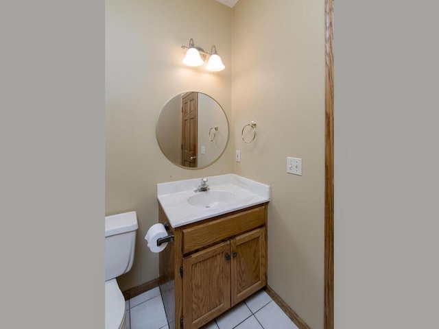 17768 Keystone Ave, Lakeville, MN 55044 - bathroom featuring vanity, toilet, tile patterned floors, and baseboards