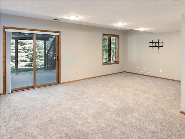 17768 Keystone Ave, Lakeville, MN 55044 - carpeted spare room with a textured ceiling and baseboards