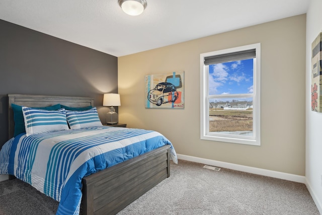 6749 168th Ln N, Ramsey, MN 55303 - carpeted bedroom featuring baseboards